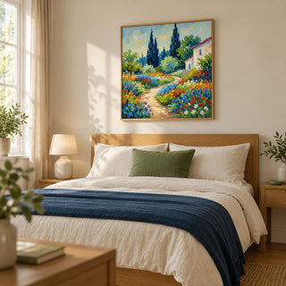 Vibrant Flower Art Print, framed on the wall of a restful main bedroom in a UK garden flat with warm ivory walls and an oak floor