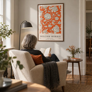 Vintage Flower Art, framed on the wall of a quiet reading corner in a mature couple's terraced home with a pale warm grey wall and original timber floorboards in a living room