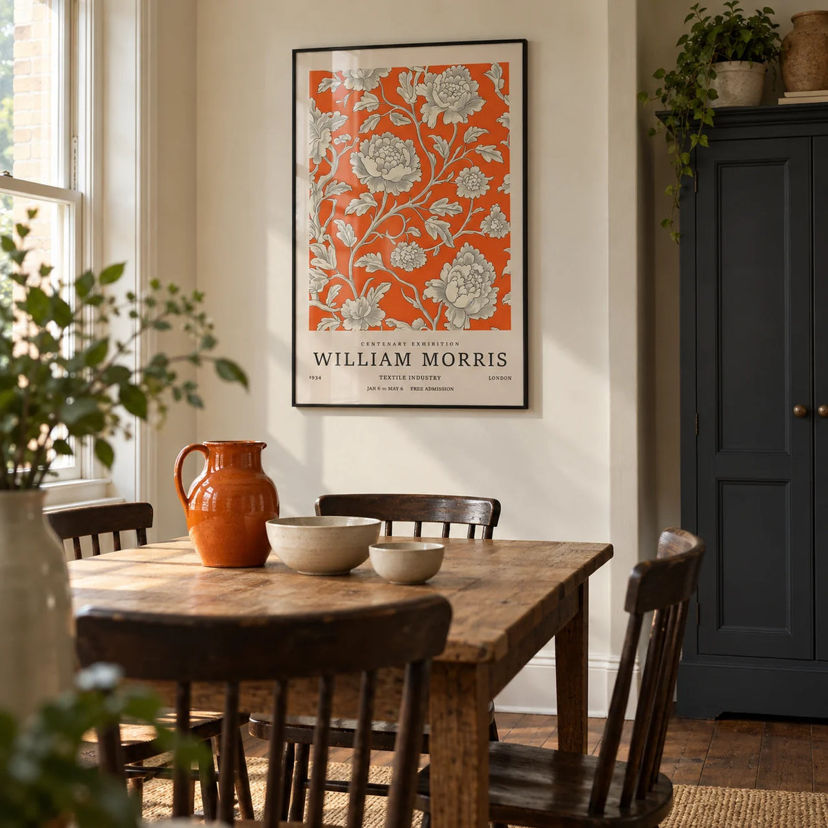 Vintage Flower Art, framed on the wall of a welcoming dining room in a period UK flat with cream walls and a shallow alcove
