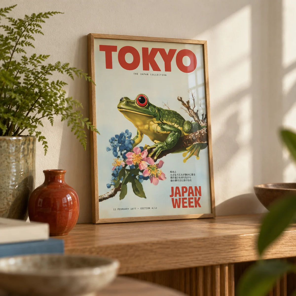 Frog Wall Art, a small A4 framed print leaning on an oak shelf in a living room