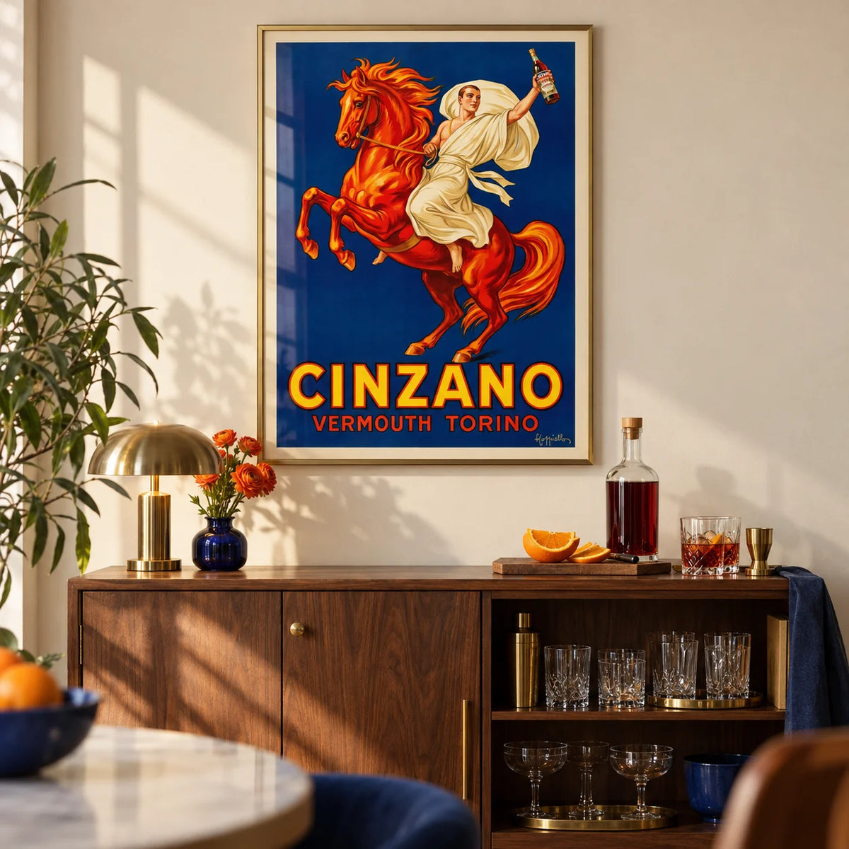 Vintage Italian Aperitif Poster, framed on the wall of a stylish home bar corner with a cream wall in a living room