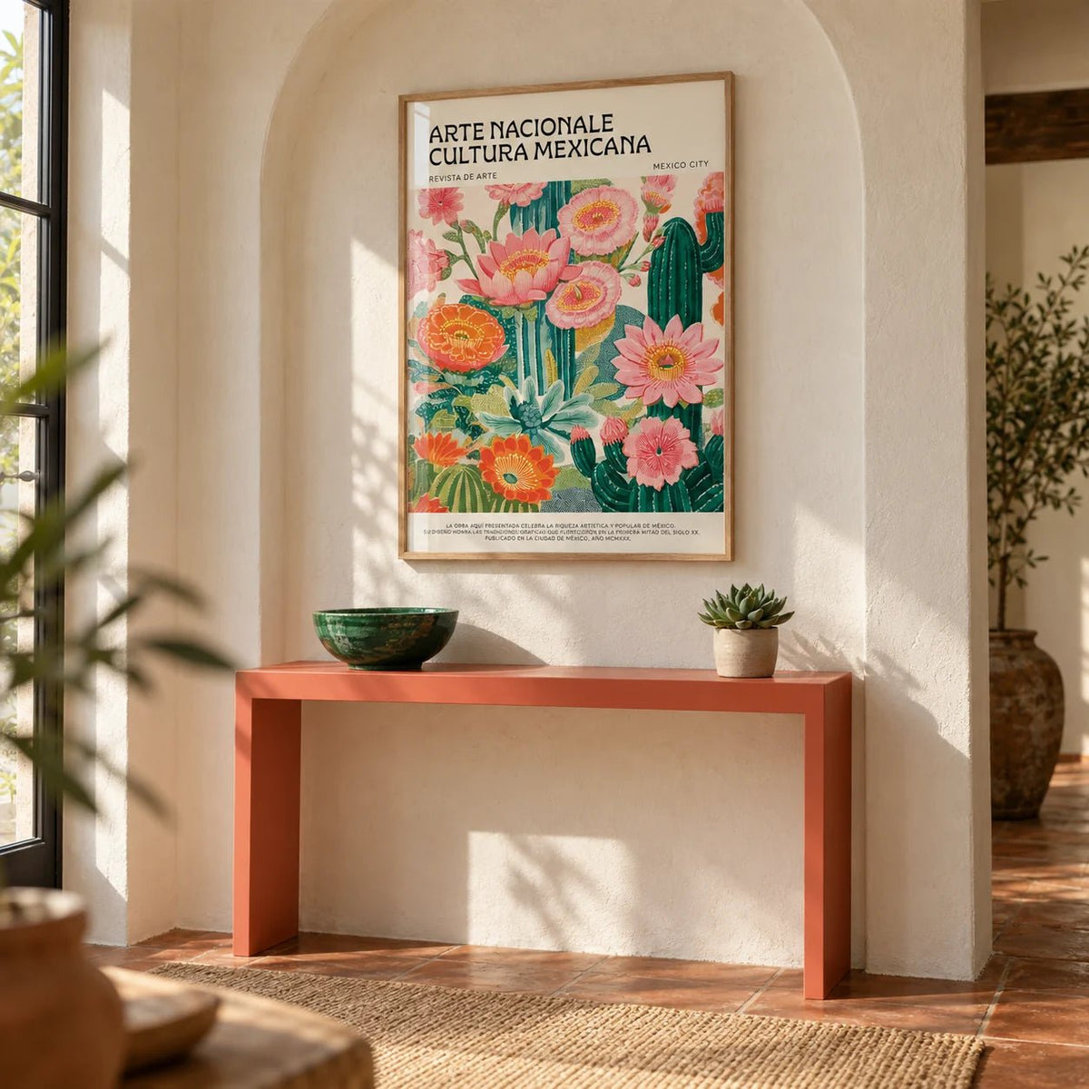 Vintage Mexican Poster, framed on the wall of a Mexican-modern hallway with an arched plaster niche