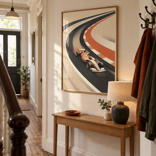 Vintage Motorsport Poster, framed on the wall of a narrow hallway in a UK Victorian terrace with cream painted walls