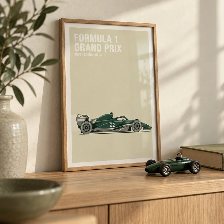 Vintage Racing Art, a small A4 framed print leaning on an oak shelf in a living room