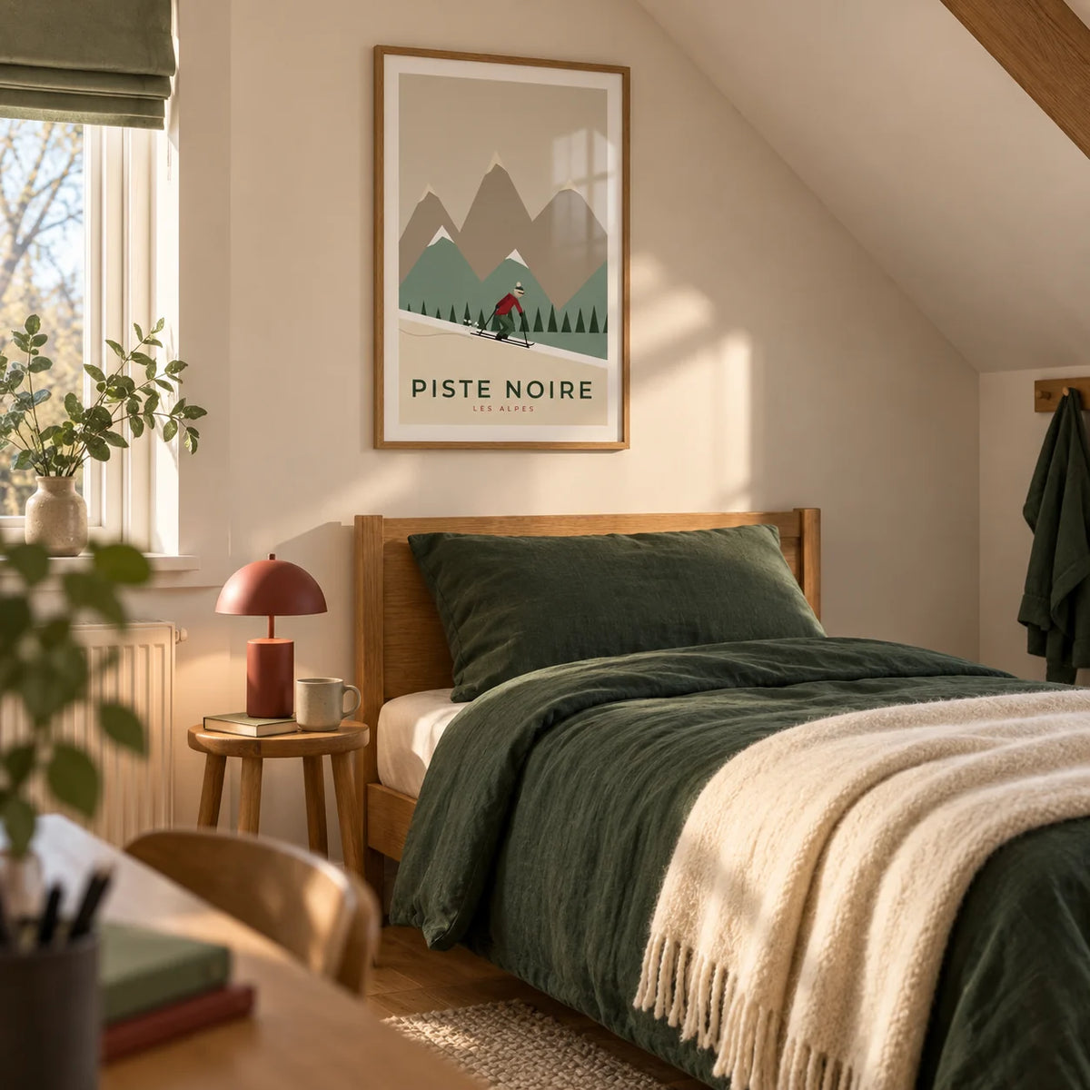 Vintage Ski Poster, framed on the wall of a warm single bedroom for a young adult skier (18-25) in a UK family home with cream walls and a sloping ceiling