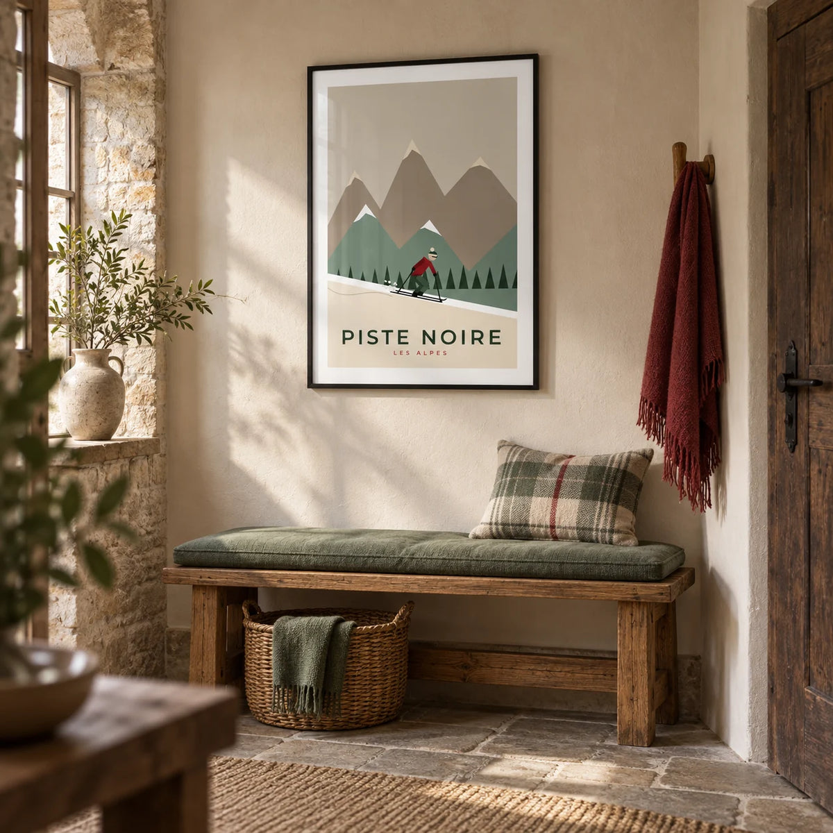 Vintage Ski Poster, framed on the wall of a welcoming entrance hallway in a UK stone cottage with warm off-white plaster