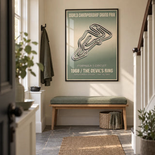 Vintage Street Circuit Map Poster, framed on the wall of a narrow entrance hallway in a renovated British terrace with a warm cream wall and grey stone floor