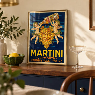 Vintage Vermouth Poster, a small A4 framed print leaning on a walnut sideboard in a dining room