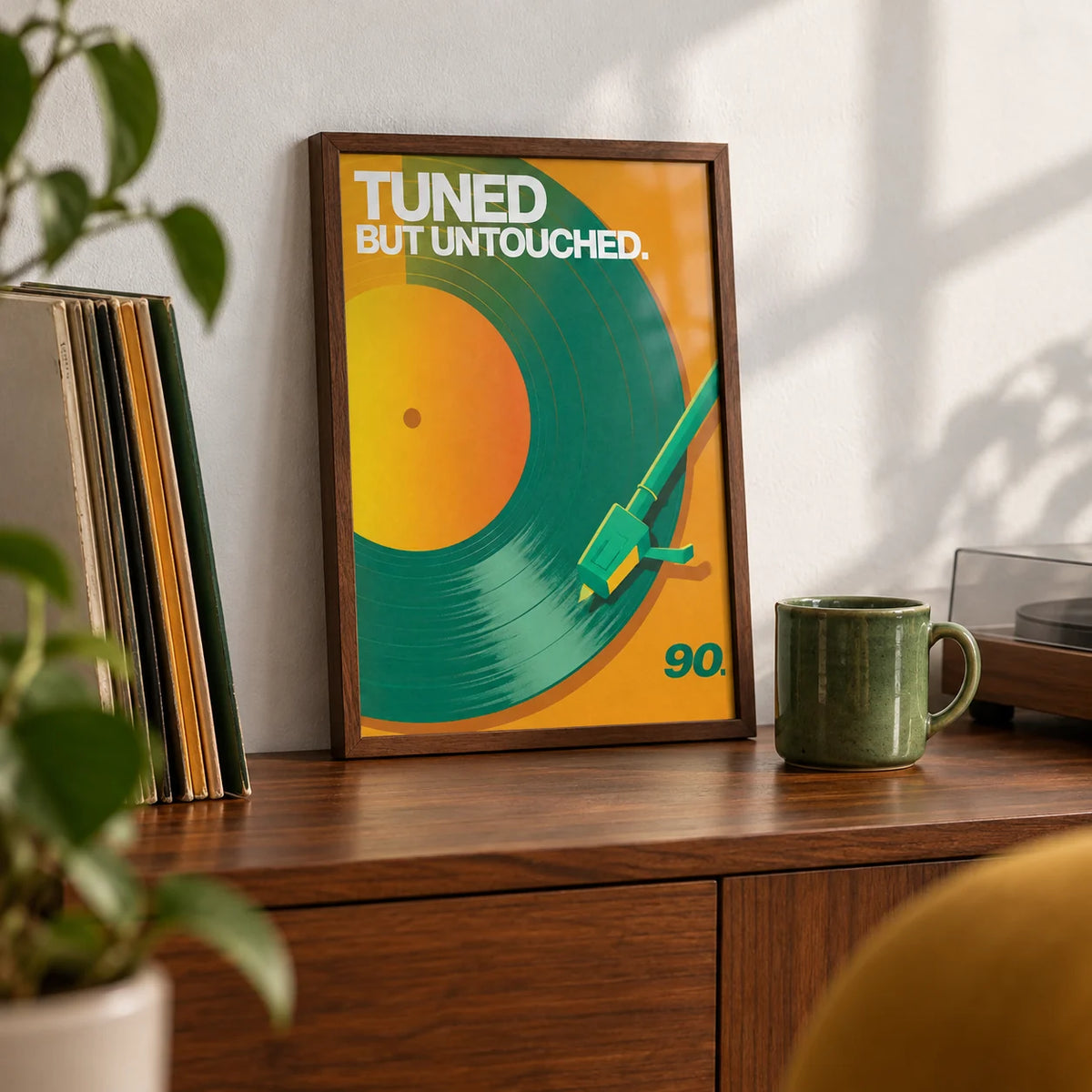 Vinyl Record Art Print, a small A4 framed print leaning on a walnut sideboard in a living room