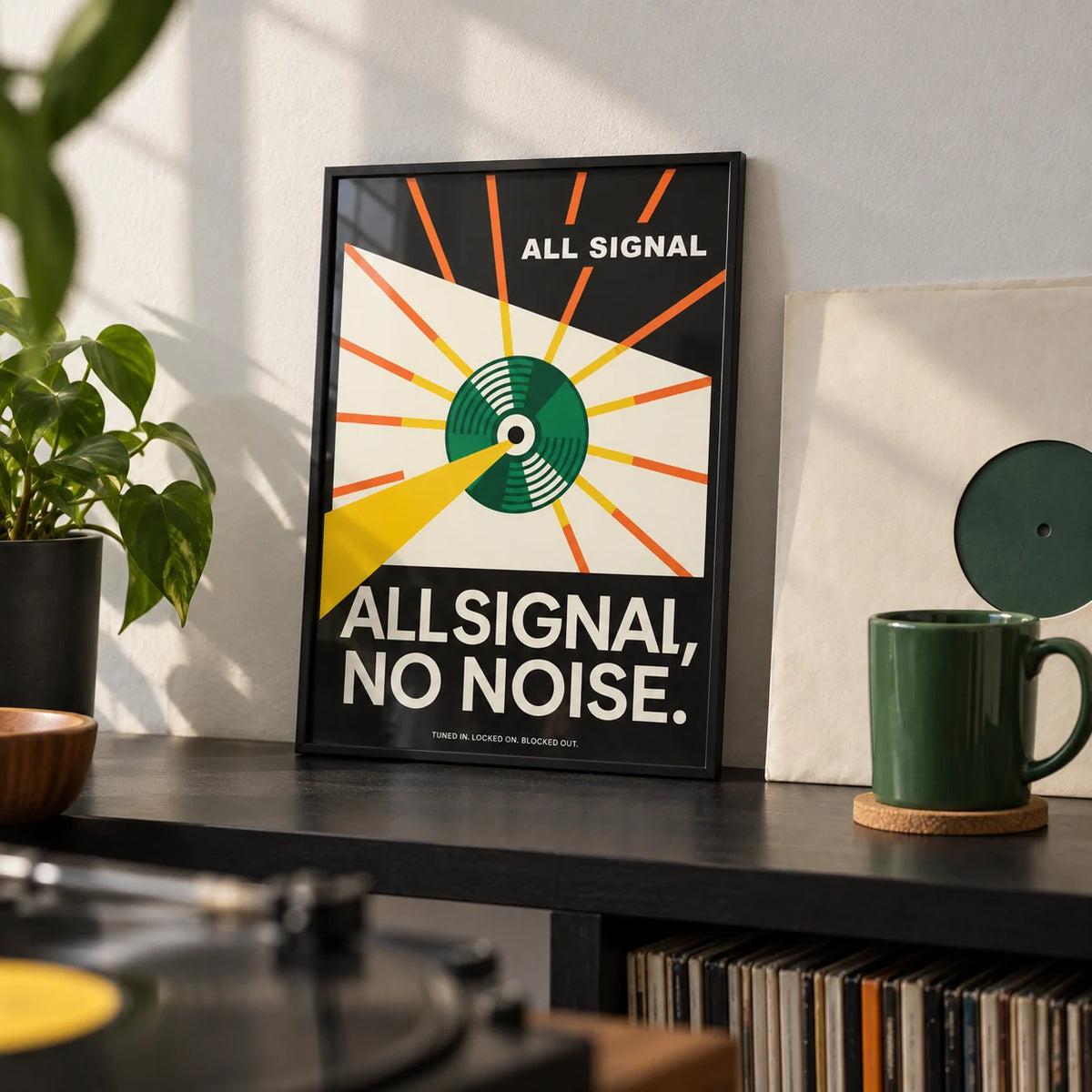 Vinyl Record Poster, a small A4 framed print leaning on a black shelf in a living room