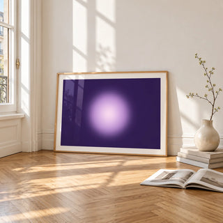 Violet Print, framed and leaning on the parquet floor of a bright living room