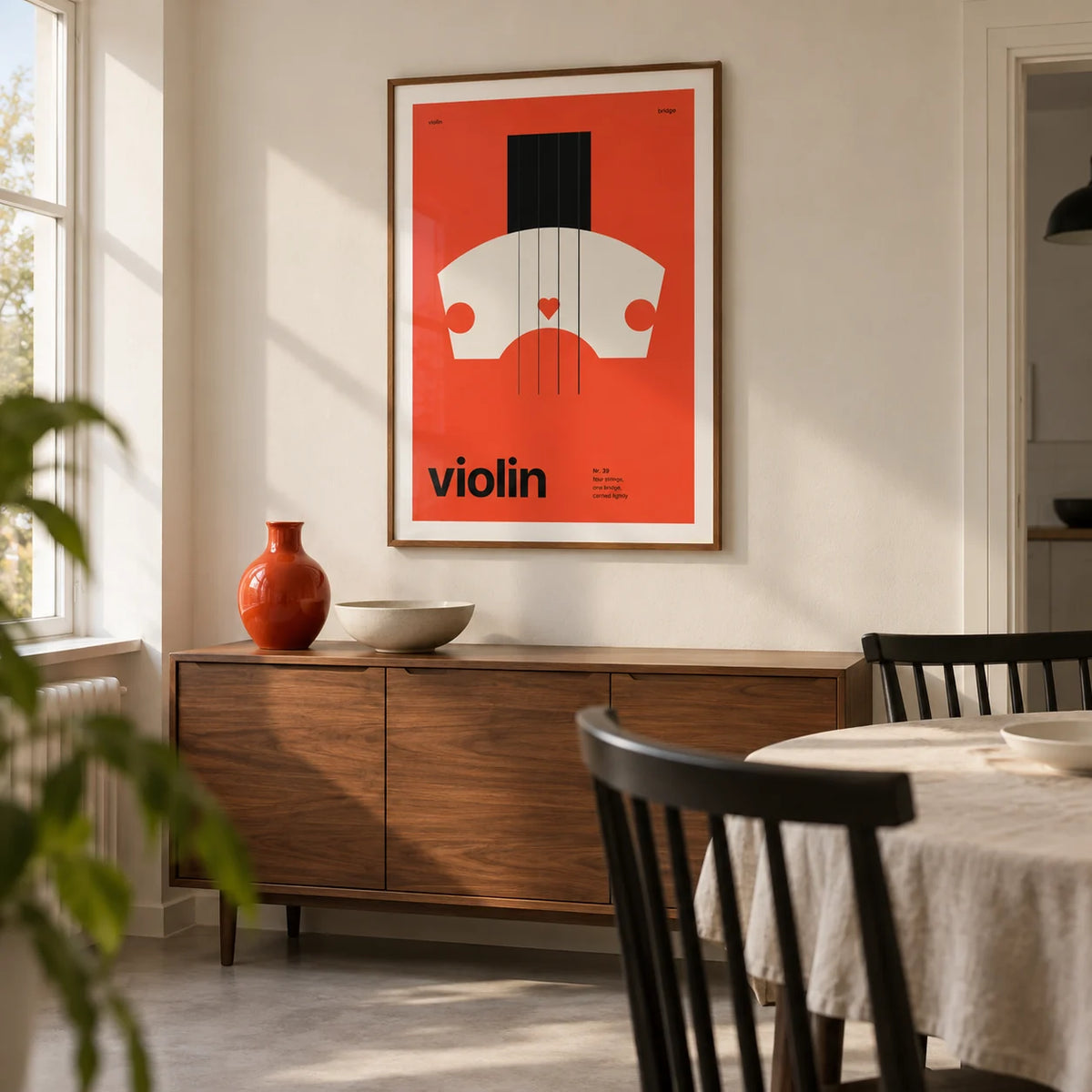 Violin Poster, framed on the wall of a modern dining room in a UK maisonette with off-white walls and a pale concrete floor