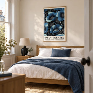 Wall Art Blue Flowers, framed on the wall of a calm modern bedroom in a Victorian terrace with a soft cream wall and original floorboards