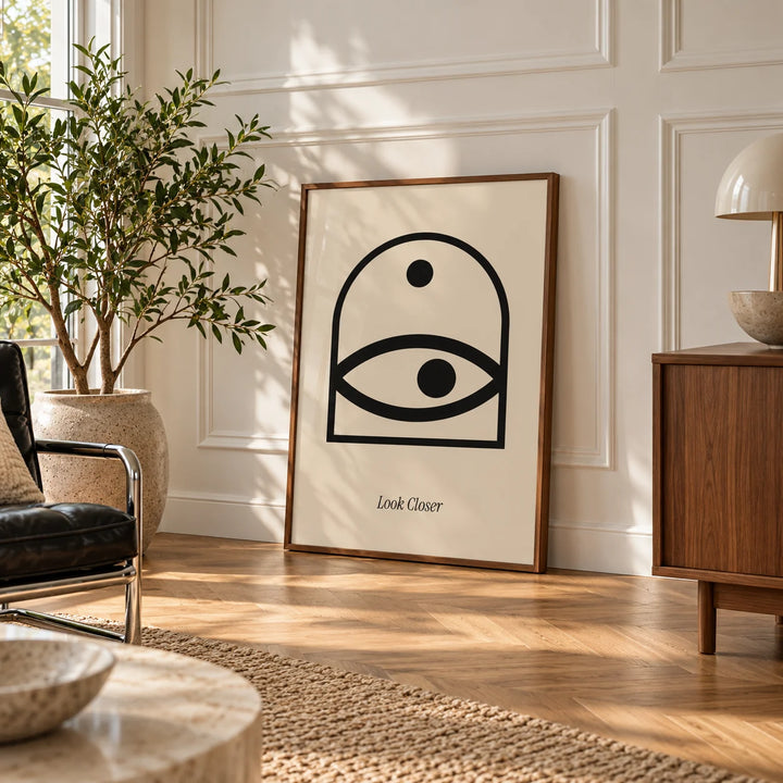 Wall Art Eye, framed on the wall of a room with white panelled walls