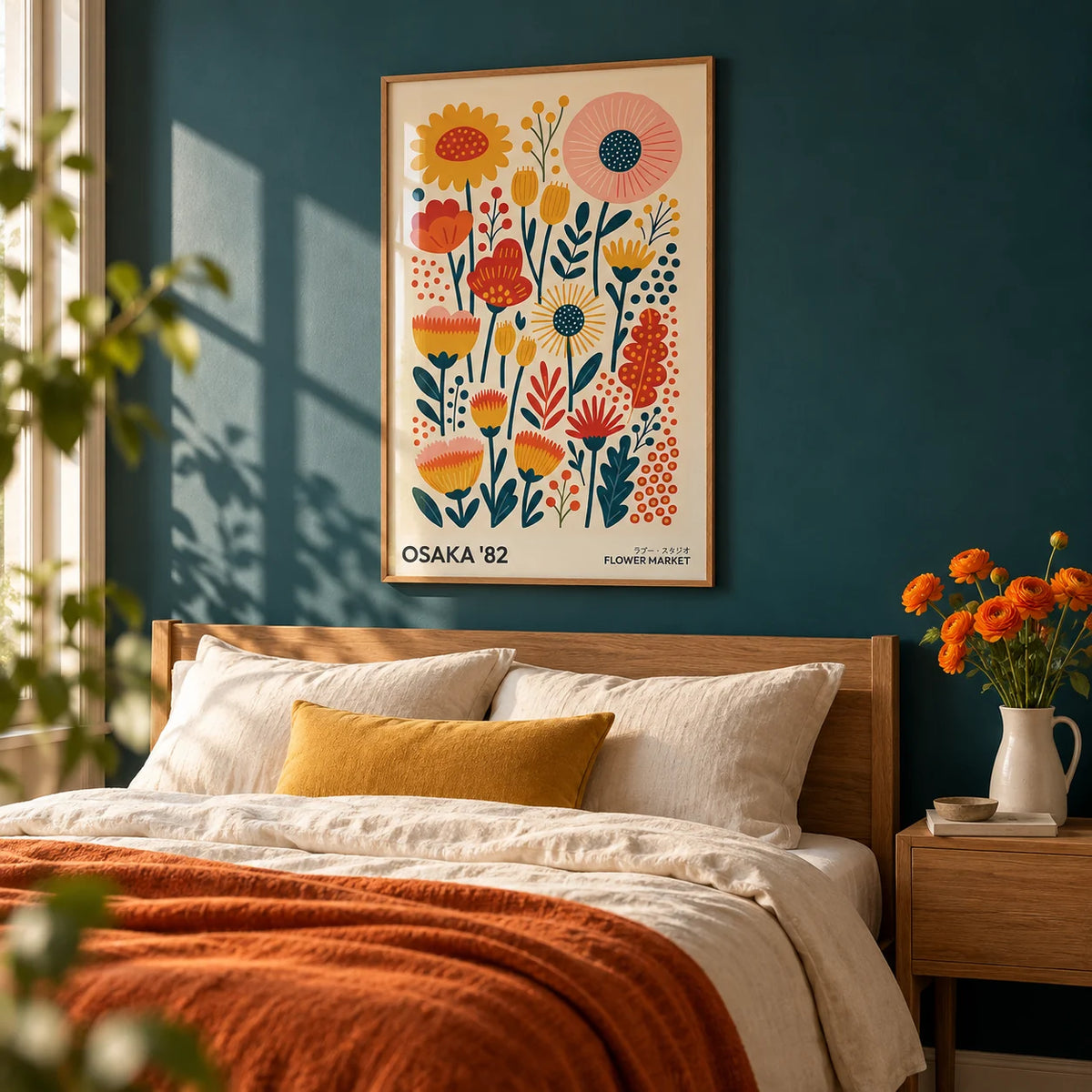 Wall Art Flowers, framed on the wall of a bright bedroom with a solid dark teal painted wall