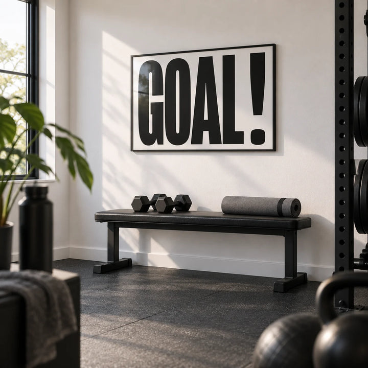 Wall Art for Games Room, framed on the wall of a modern home gym in a converted spare room with a white wall and black rubber flooring