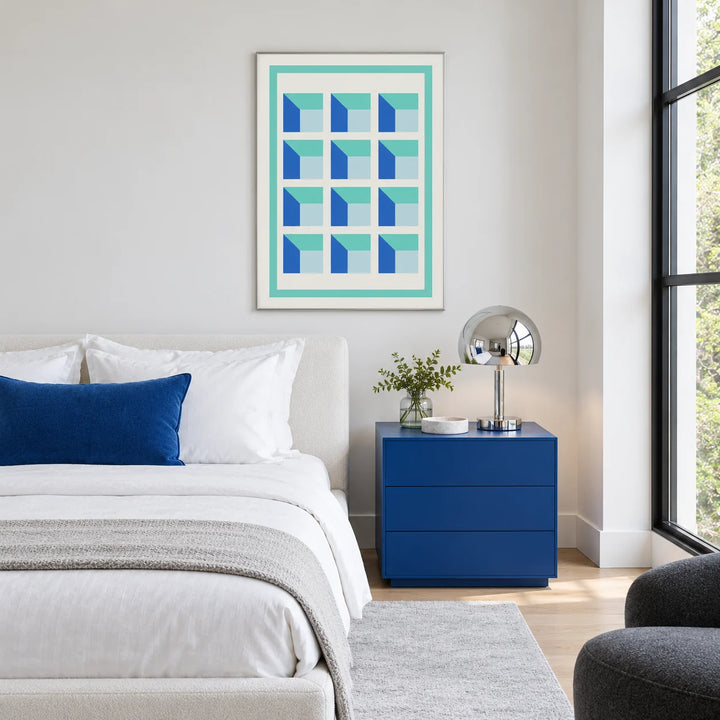 Wall Art for Home Office, framed on the wall of a calm white bedroom with a cobalt bedside cabinet