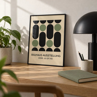 Wall Art for Office, a small A4 framed print leaning on an oak desk