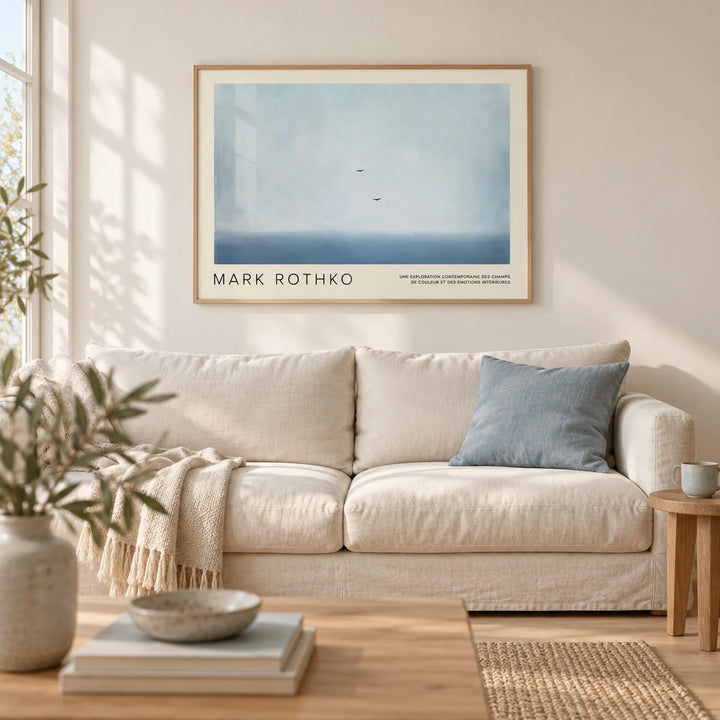 Wall Art Light Blue, framed on the wall of a calm coastal living room with a warm white wall and a pale oak floor