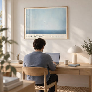 Wall Art Light Blue, framed on the wall of a calm home office with a soft white wall