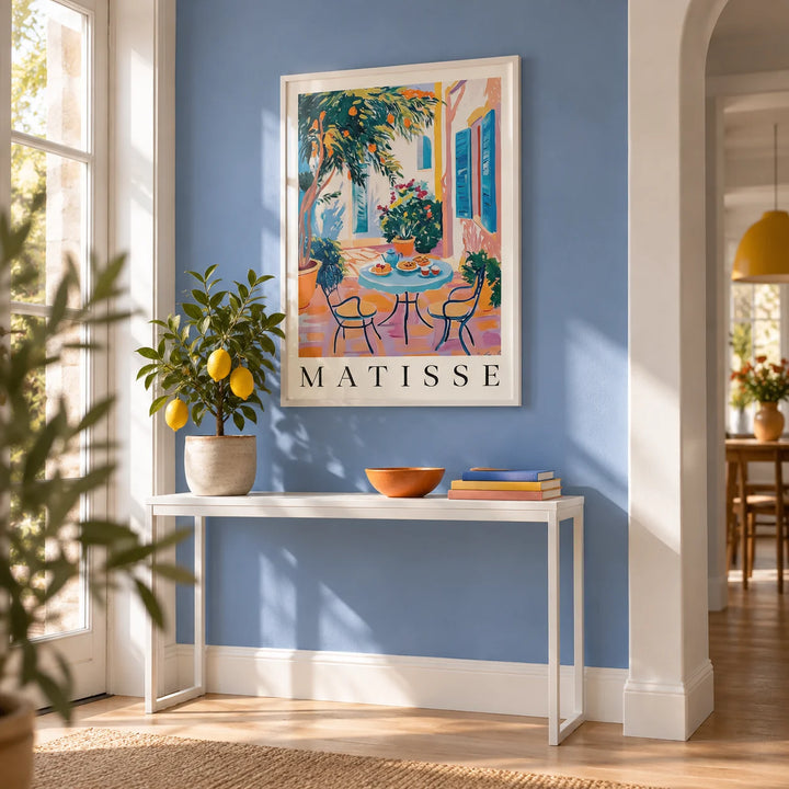 Wall Art Mediterranean, framed on the wall of a bright hallway with a pale cobalt blue painted wall