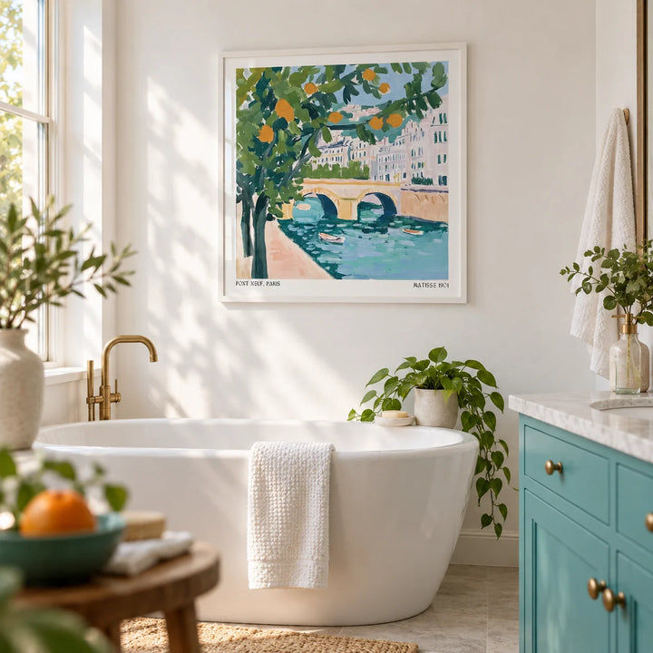 Wall Art of Paris, framed on the wall of a bright bathroom with plain white walls and a plain turquoise painted vanity