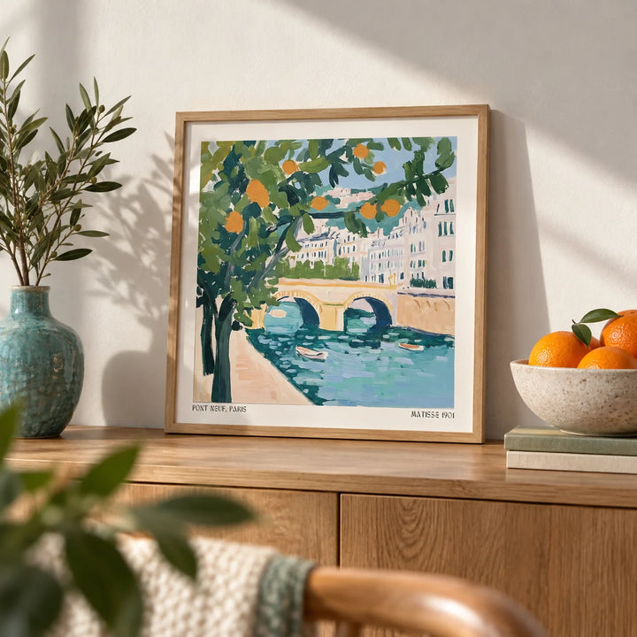 Wall Art of Paris, a small A4 framed print leaning on an oak shelf in a living room