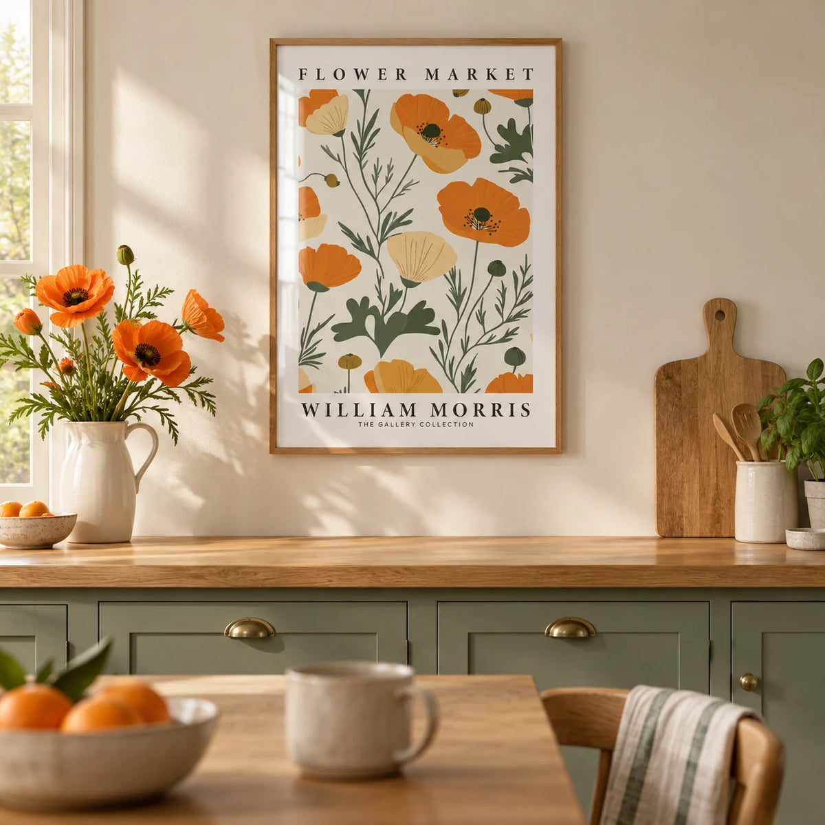 Wall Art Poppies, framed on the wall of a calm cream kitchen with sage green cabinets and an oak worktop