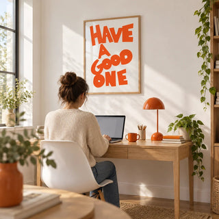 Wall Art Typography, framed on the wall of a bright home office with a white wall