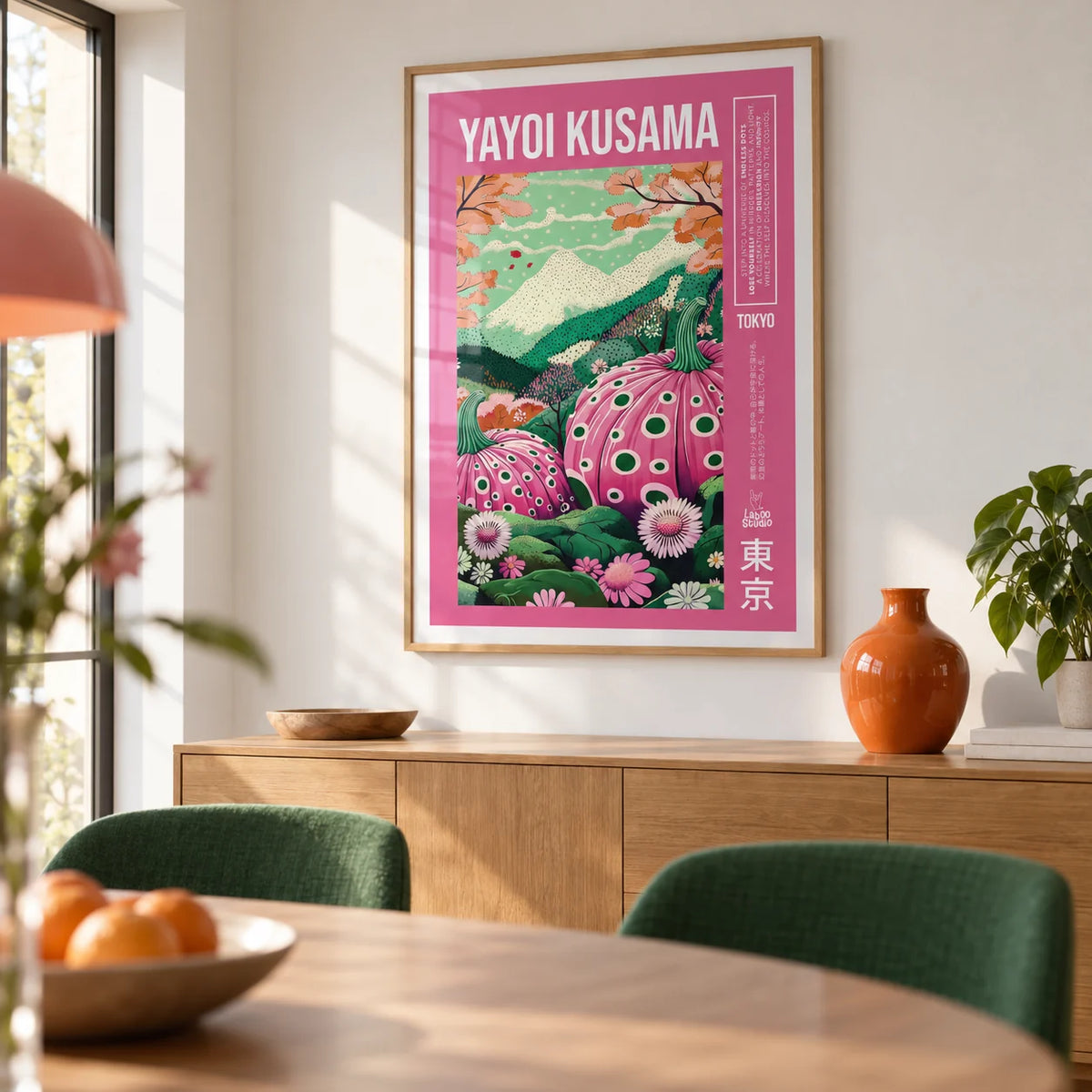 Wall Art with Pink, framed on the wall of a design-led dining room with a white wall