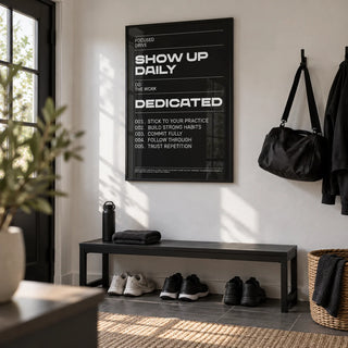 Wall Art Work, framed on the wall of a modern boot room by the back door with a white wall in a hallway