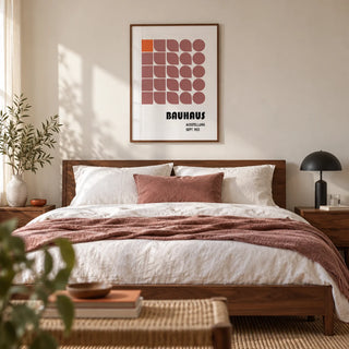 Wall Hanging Geometric, framed on the wall of a calm modern bedroom with a warm white wall