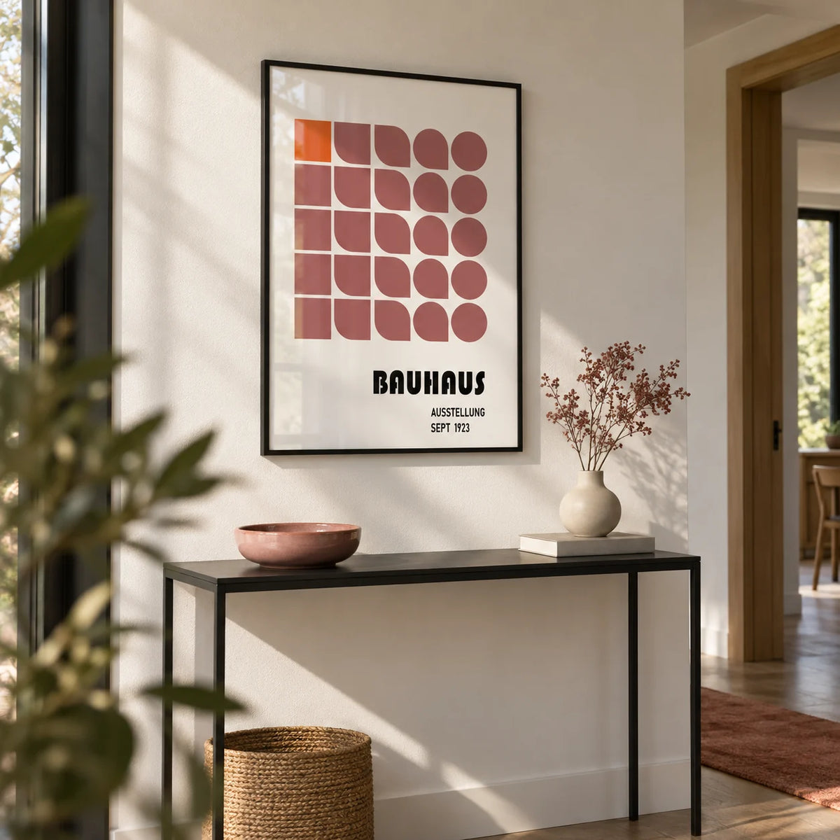 Wall Hanging Geometric, framed on the wall of a modern hallway with a white wall