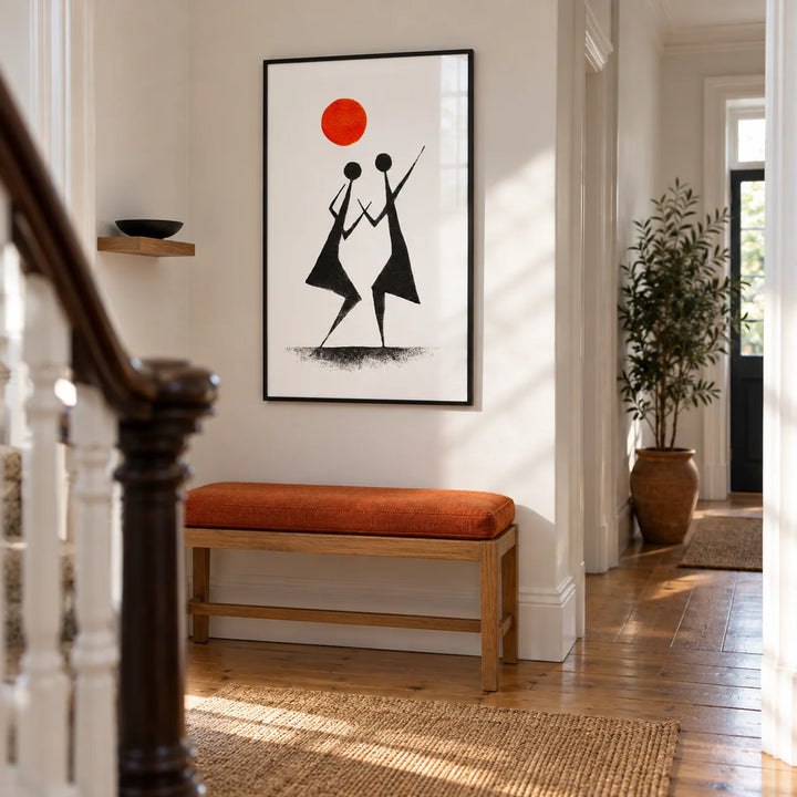 Warli Folk Art Print, framed on the wall of a bright narrow hallway in a renovated Victorian terrace with chalk-white walls and honey-toned floorboards