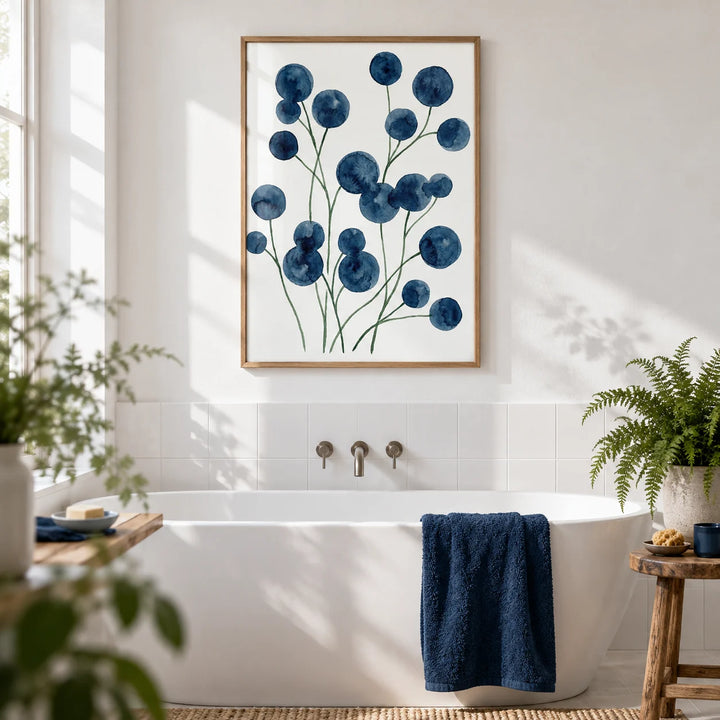 Watercolor Flower Wall Art, framed on the wall of a calm bathroom with a white wall and plain white tiles