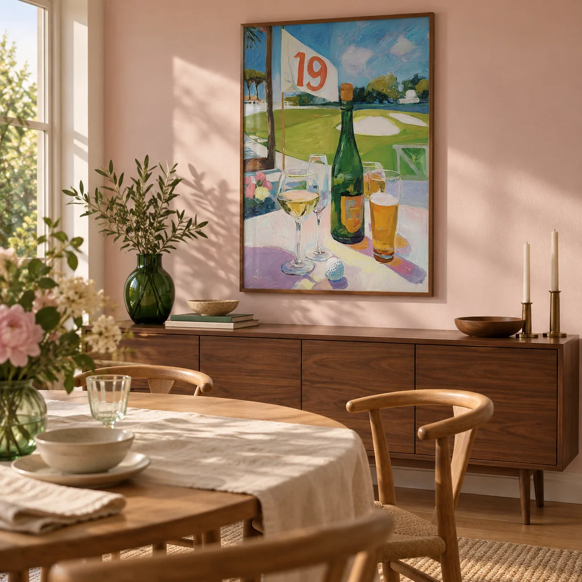 Watering Hole Golf Art Print, framed on the wall of a relaxed dining room in a golf-loving couple's UK home with a pale pink wall and oak floorboards