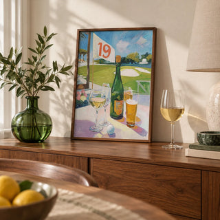 Watering Hole Golf Art Print, a small A4 framed print leaning on a walnut dining-room sideboard