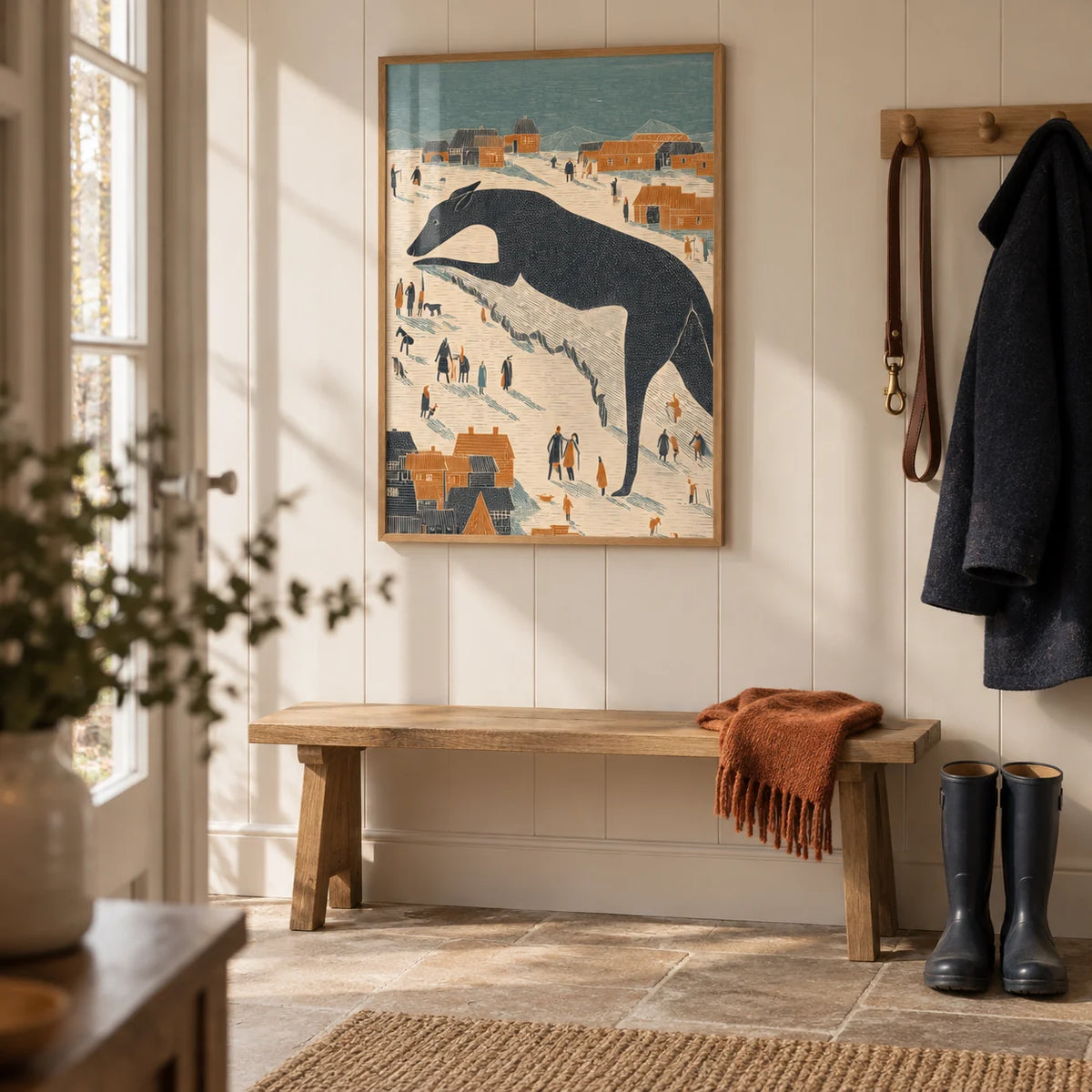 Whimsical Dog Art, framed on the wall of a country boot room hallway with warm white painted panelling and a plain stone floor