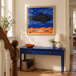 Whimsical Fish Art Print, framed on the wall of a bright hallway in a modest UK terrace with cream walls and timber floorboards