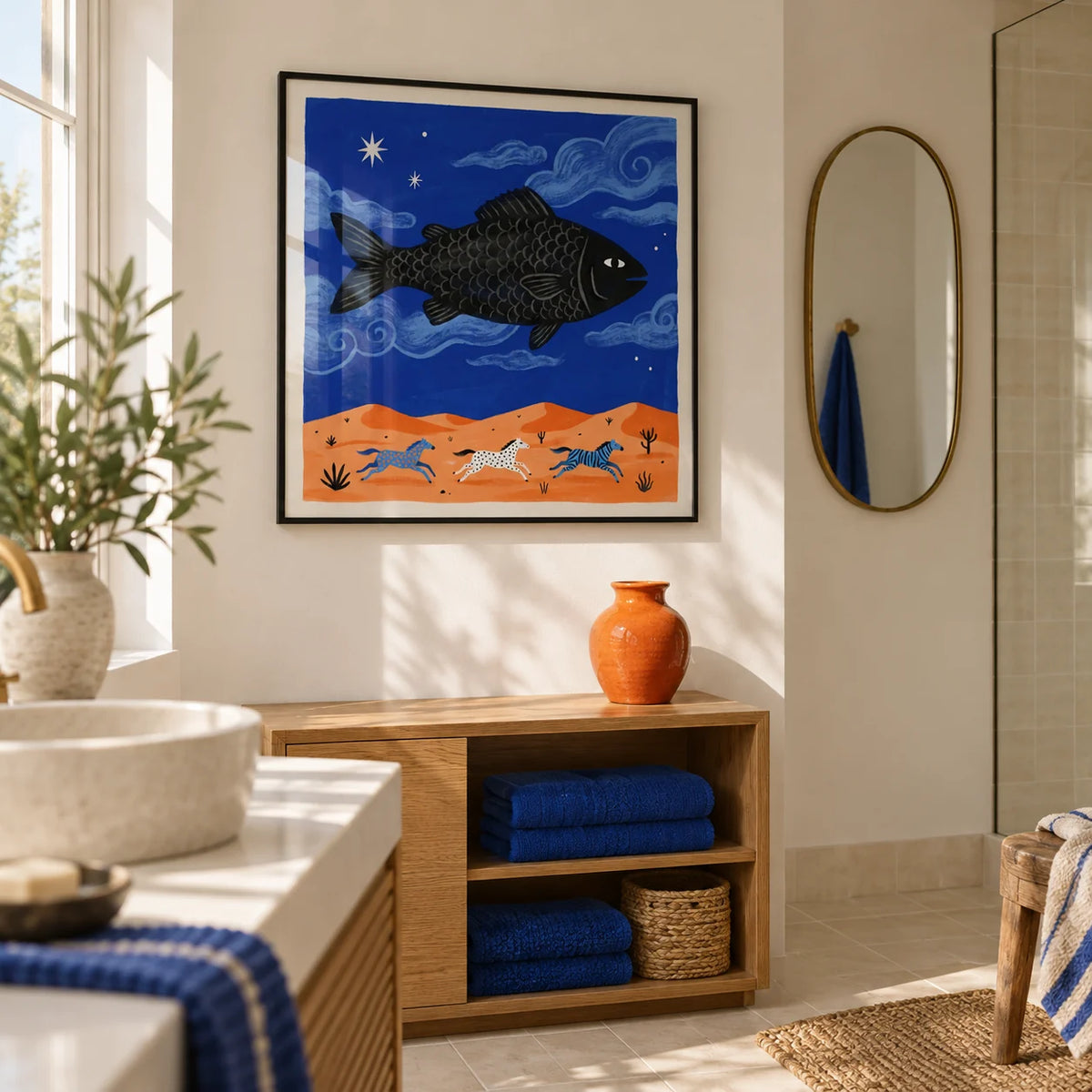 Whimsical Fish Art Print, framed on the wall of a playful modern coastal bathroom with warm white walls and plain cream tiles