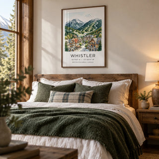 Whistler Mountain Print, framed on the wall of a cabin-style bedroom