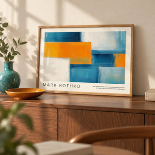 Wide Wall Art, a small A4 framed print leaning on a walnut sideboard in a living room