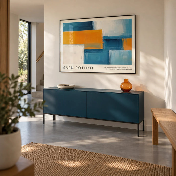Wide Wall Art, framed on the wall of a spacious entrance hallway in a contemporary UK family home with off-white plaster walls and a smooth grey floor
