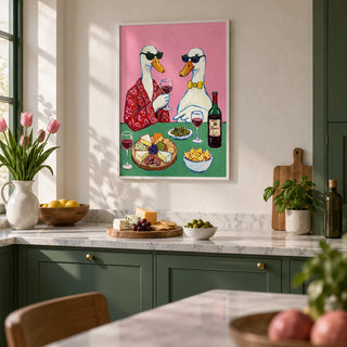 Wine And Cheese Poster, framed on the wall of a modern kitchen with solid green painted cabinets and white plaster walls