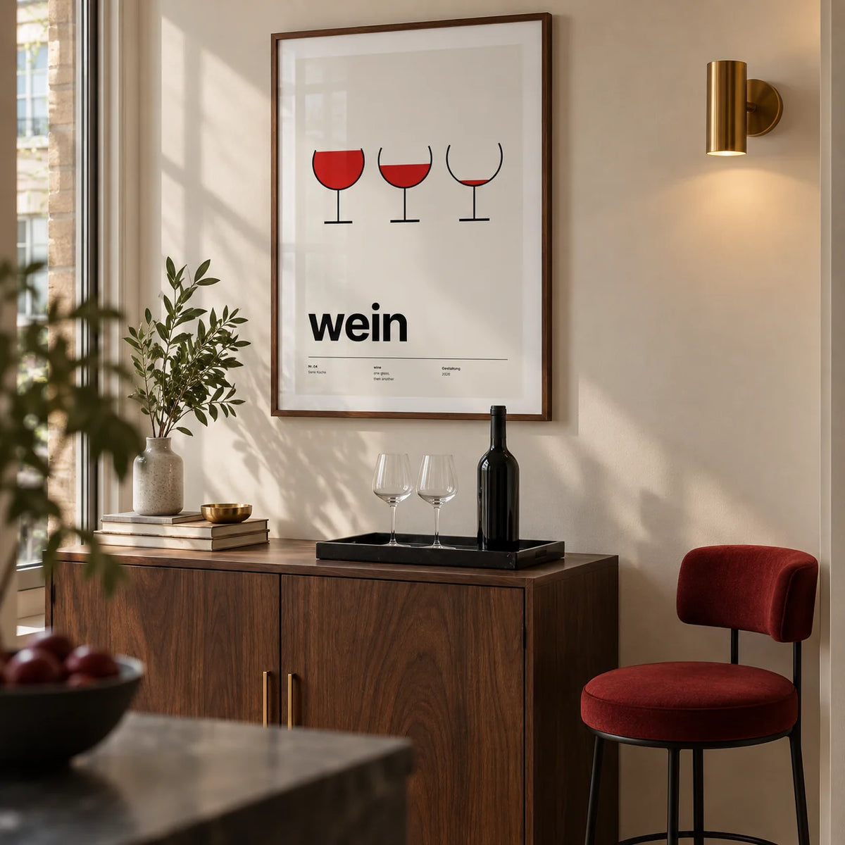 Wine Poster, framed on the wall of a compact home bar alcove in a modern UK flat with a warm off-white wall and a walnut drinks cabinet in a living room
