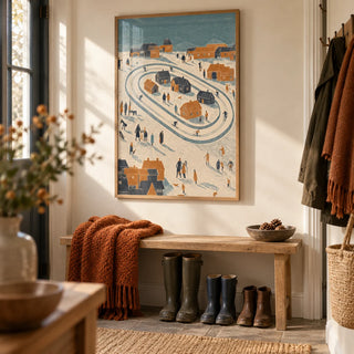 Winter Village Art Print, framed on the wall of a cosy boot room hallway with a cream wall