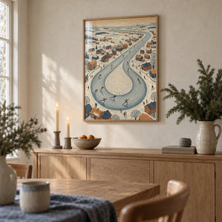 Winter Village Scene, framed on the wall of a cottage dining room with a cream limewashed wall