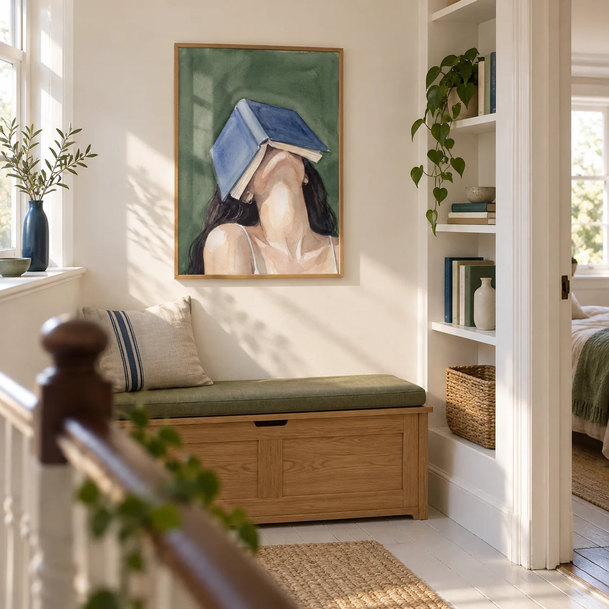 Woman Reading Portrait Print, framed on the wall of a bright upstairs landing in a terraced house with warm white walls and painted floorboards