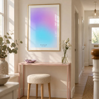 Wonder Poster, framed on the wall of a fresh contemporary hallway in a UK terraced home with a warm white wall and light timber floor