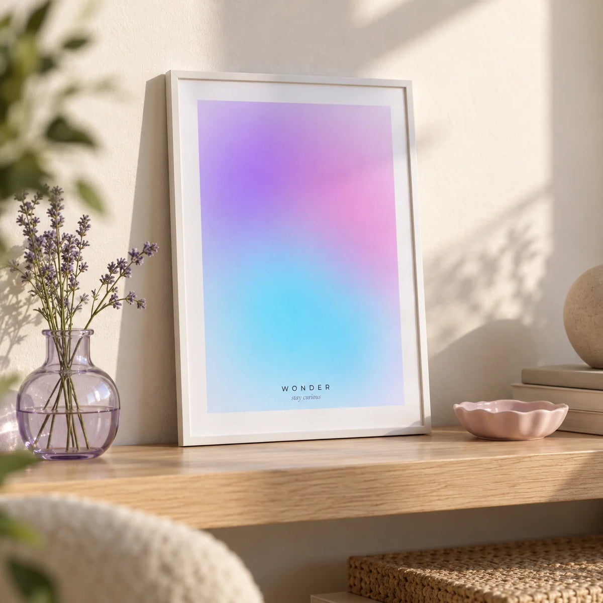 Wonder Poster, a small A4 framed print leaning on a pale oak shelf in a living room